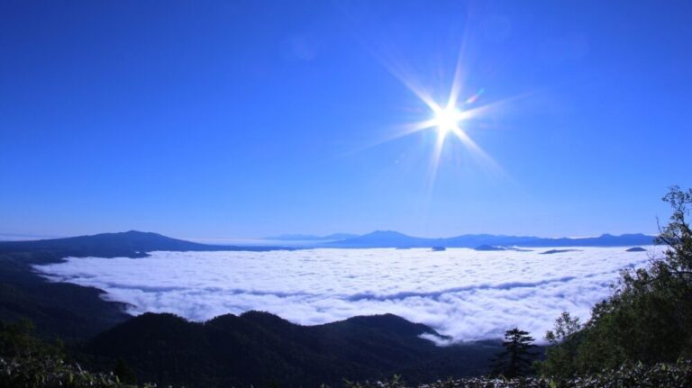 Two breathtaking views from Tsubetsu Pass: the Kussharo Lake Sea of Clouds Tour and the Starry Sky Universe Tour